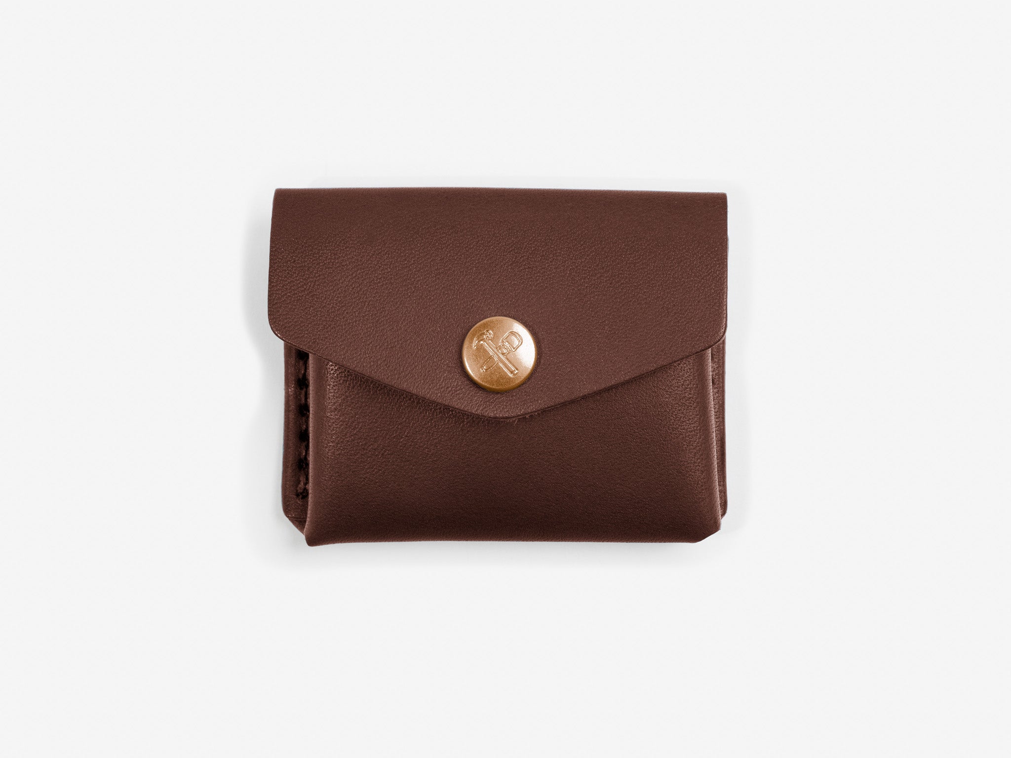 A closed hickory coin pouch with a brass snap featuring a hammer and maul logo