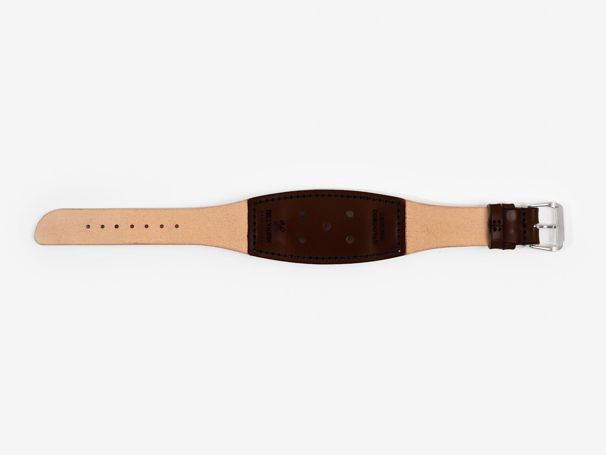 A wide, dark brown cordovan leather watch strap with black stitching, adjustment holes, a silver buckle, and the brand name BILLYKIRK embossed on it.