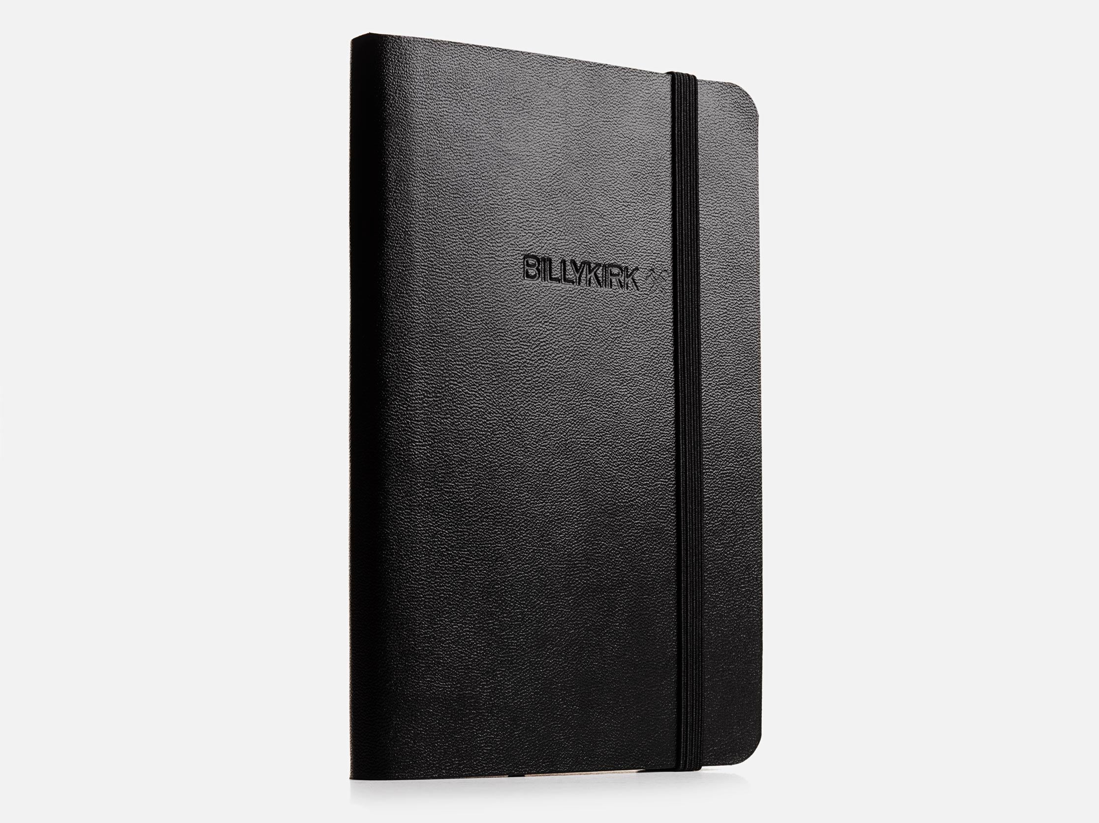 A black, hardcover notebook with rounded corners and an elastic band closure, featuring the word BILLYKIRK embossed on the front cover, photographed against a plain white background.
