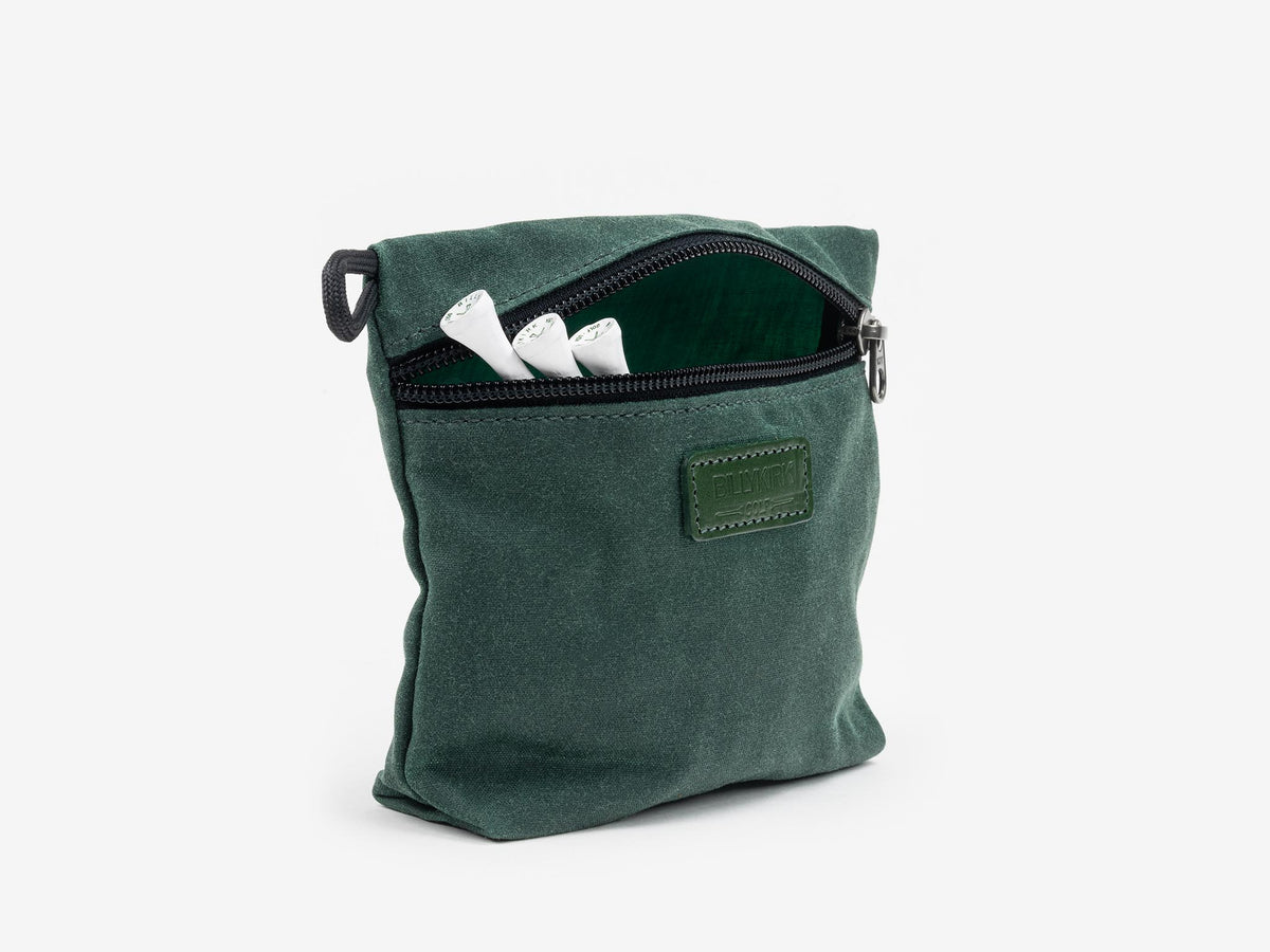 A small, dark green zippered pouch with a fabric patch on the front, partially unzipped to reveal three white markers inside, against a plain white background.
